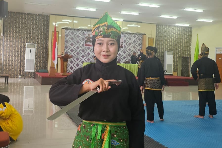 Mahasiswi Ekonomi Syariah FEBI UIN Madura Tampil Membela Kampus pada Cabang Pencak Silat Kategori Tunggal Full di The 4th SeIBa International Festival 2026